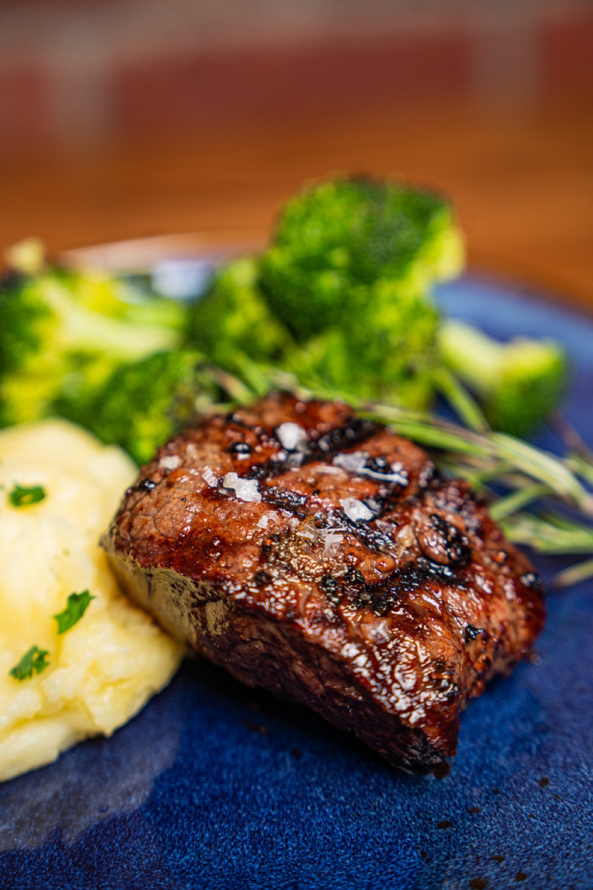 Grilled steak with mashed potatoes and broccoli at The Bell in Scona