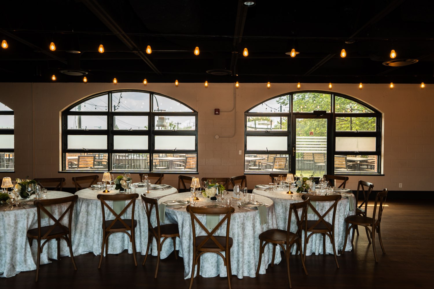 The Bell Room set with round banquet tables