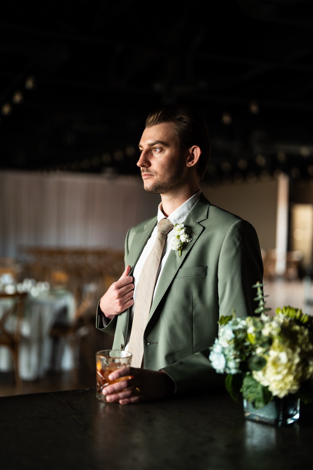 Groom at the bar with an old fashioned