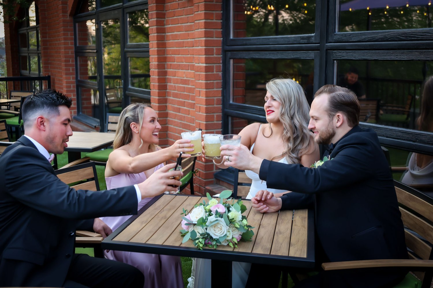 Friends toasting on the patio