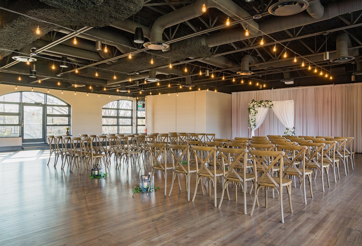 Ceremony seating with draped backdrop