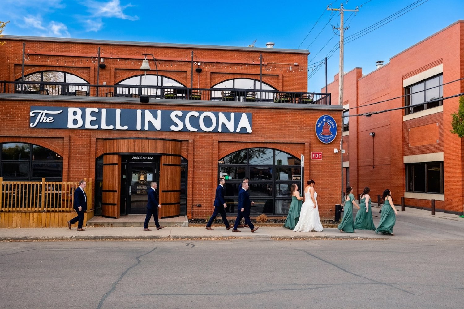 The Bell in Scona exterior with wedding party